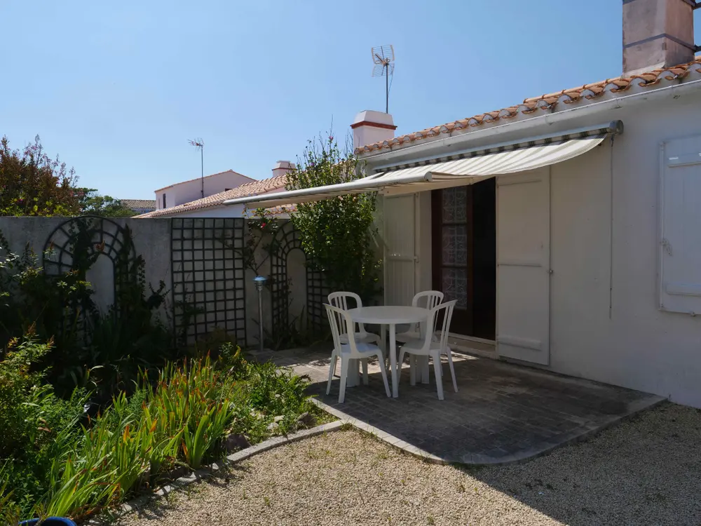Terrasse ombragée d'une maison de pêcheur